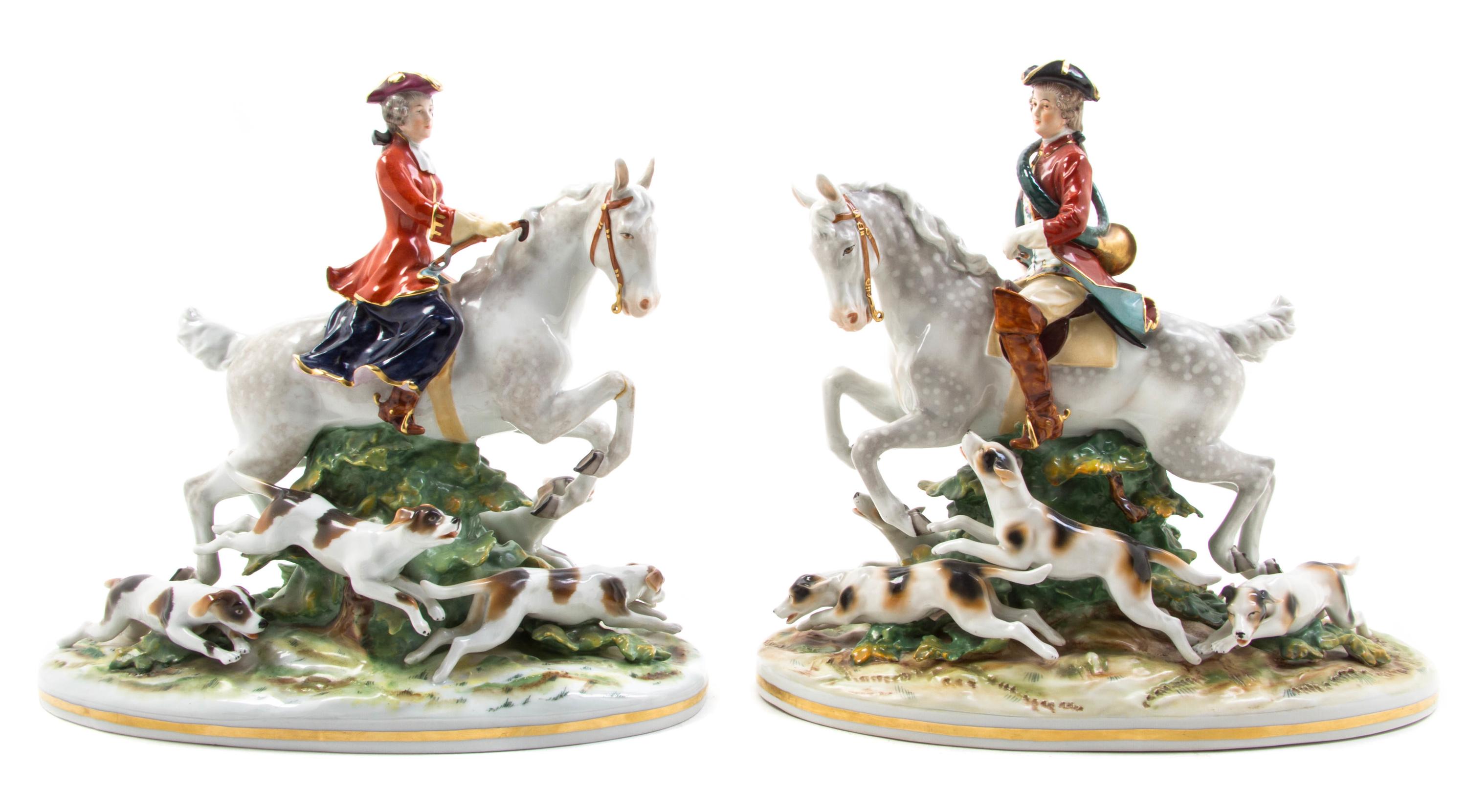 A Pair of German Porcelain Figural Groups, Height 12 3/4 inches.