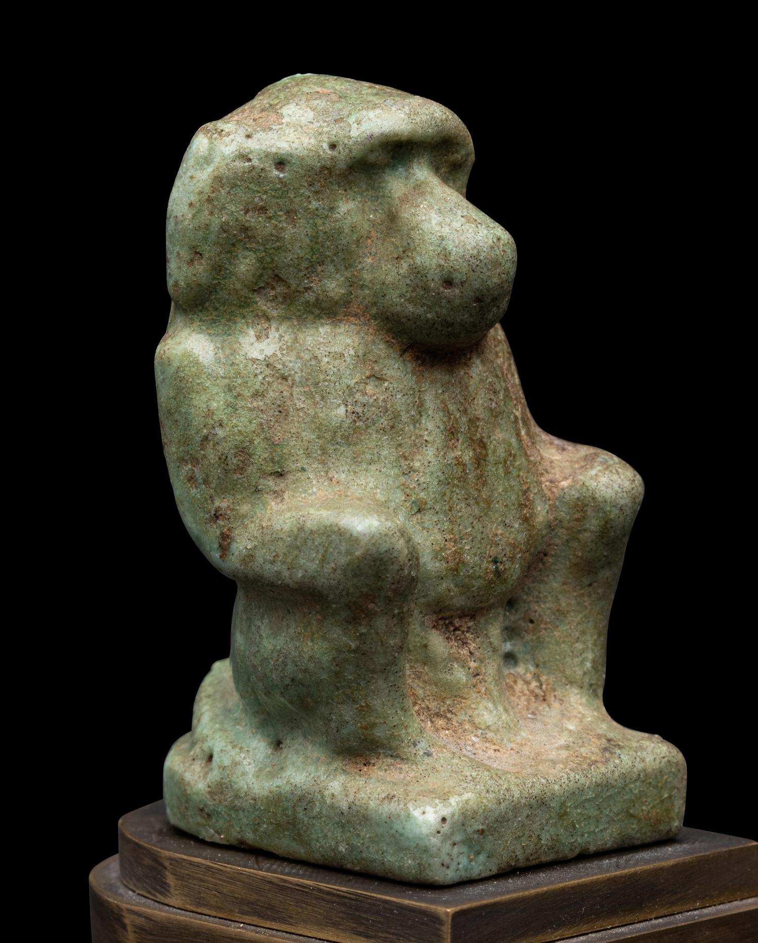 An Egyptian Faience Baboon