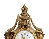 A Louis XVI Style Gilt Bronze Cartel Clock