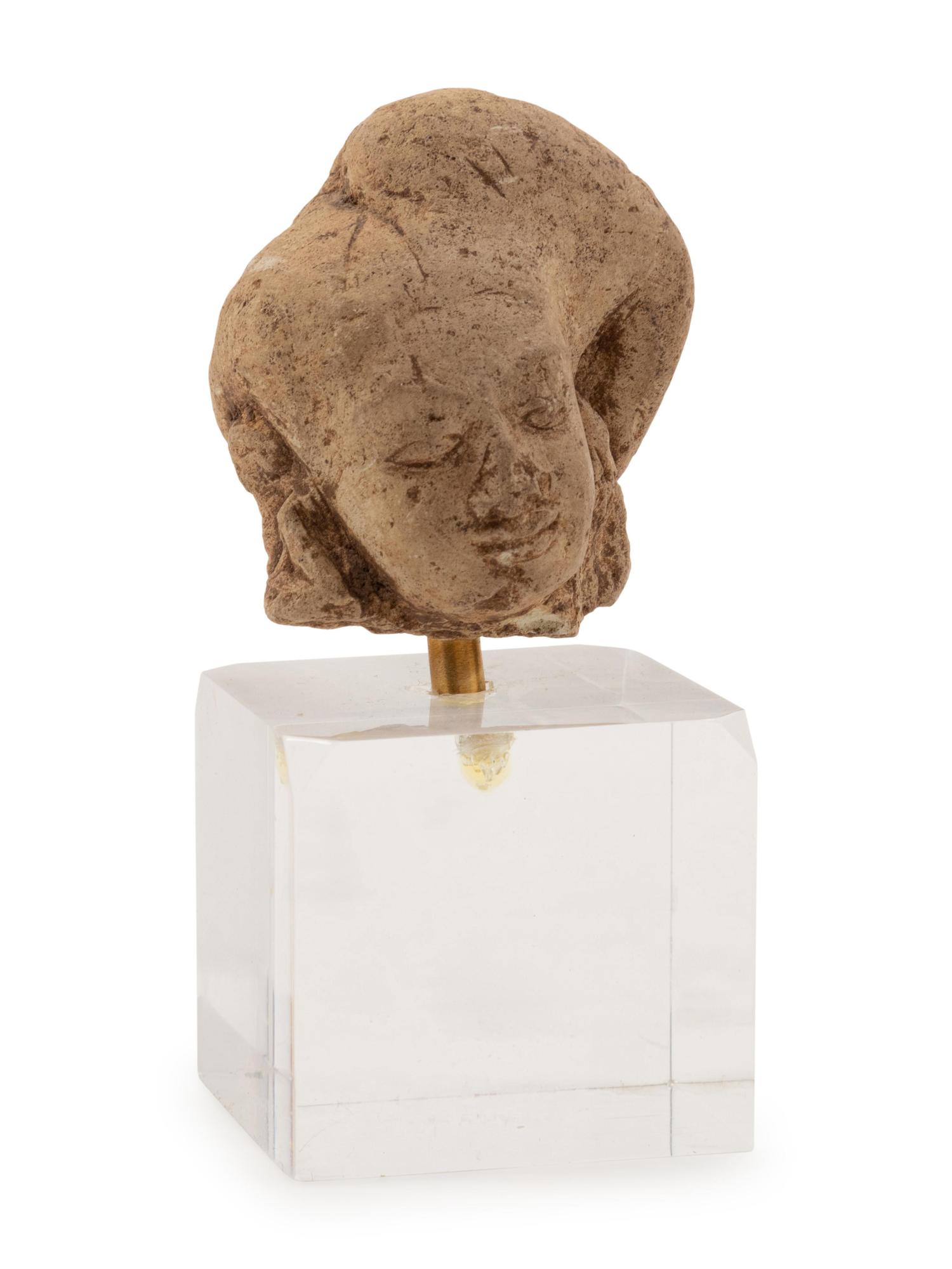An Egyptian-Style Stucco Figure of Anubis