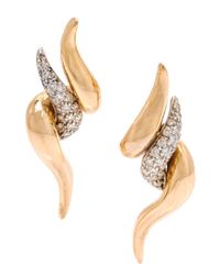 A Pair of 18 Karat Bicolor Gold and Diamond Earclips, 7.10 dwts.