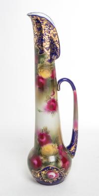 A Continental Porcelain Ewer Height 21 3/4 inches. — 19TH/20TH CENTURY
