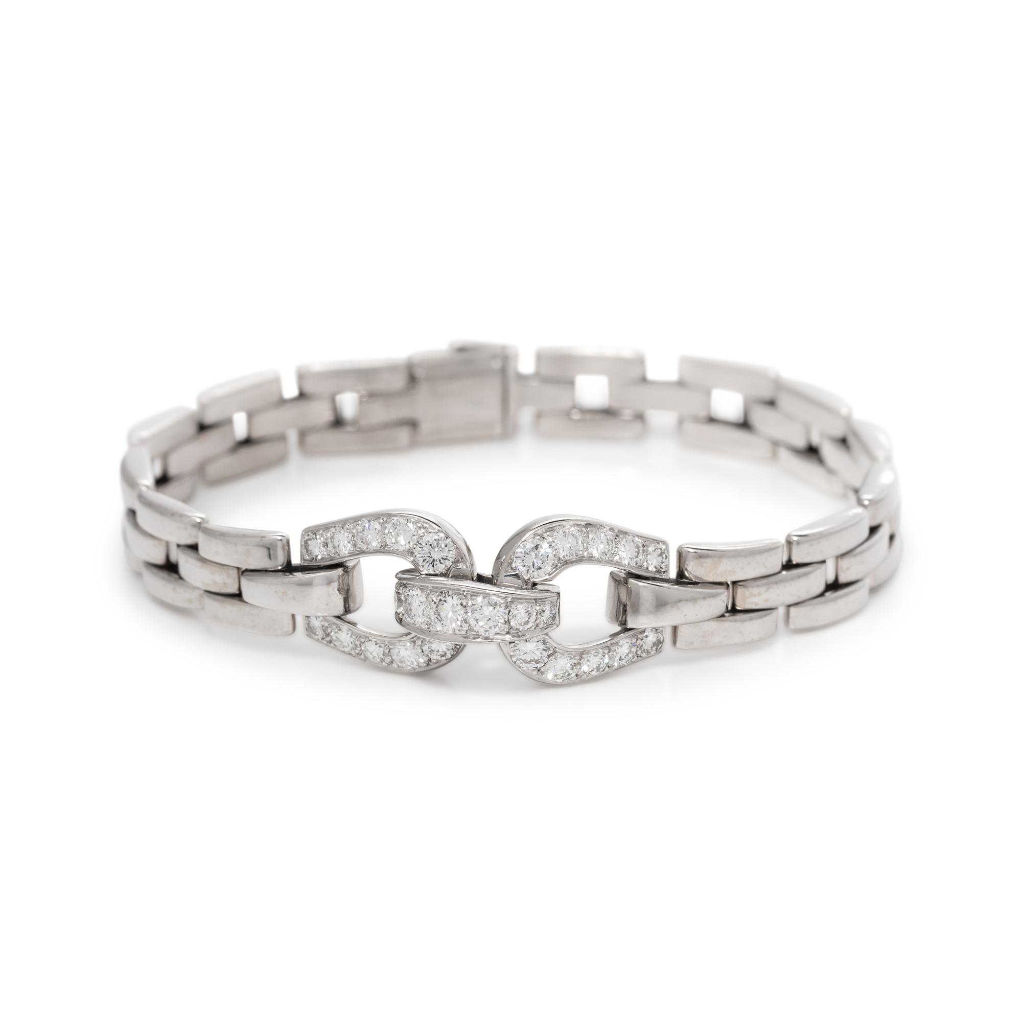 CARTIER, WHITE GOLD AND DIAMOND 'ETRIER' BRACELET