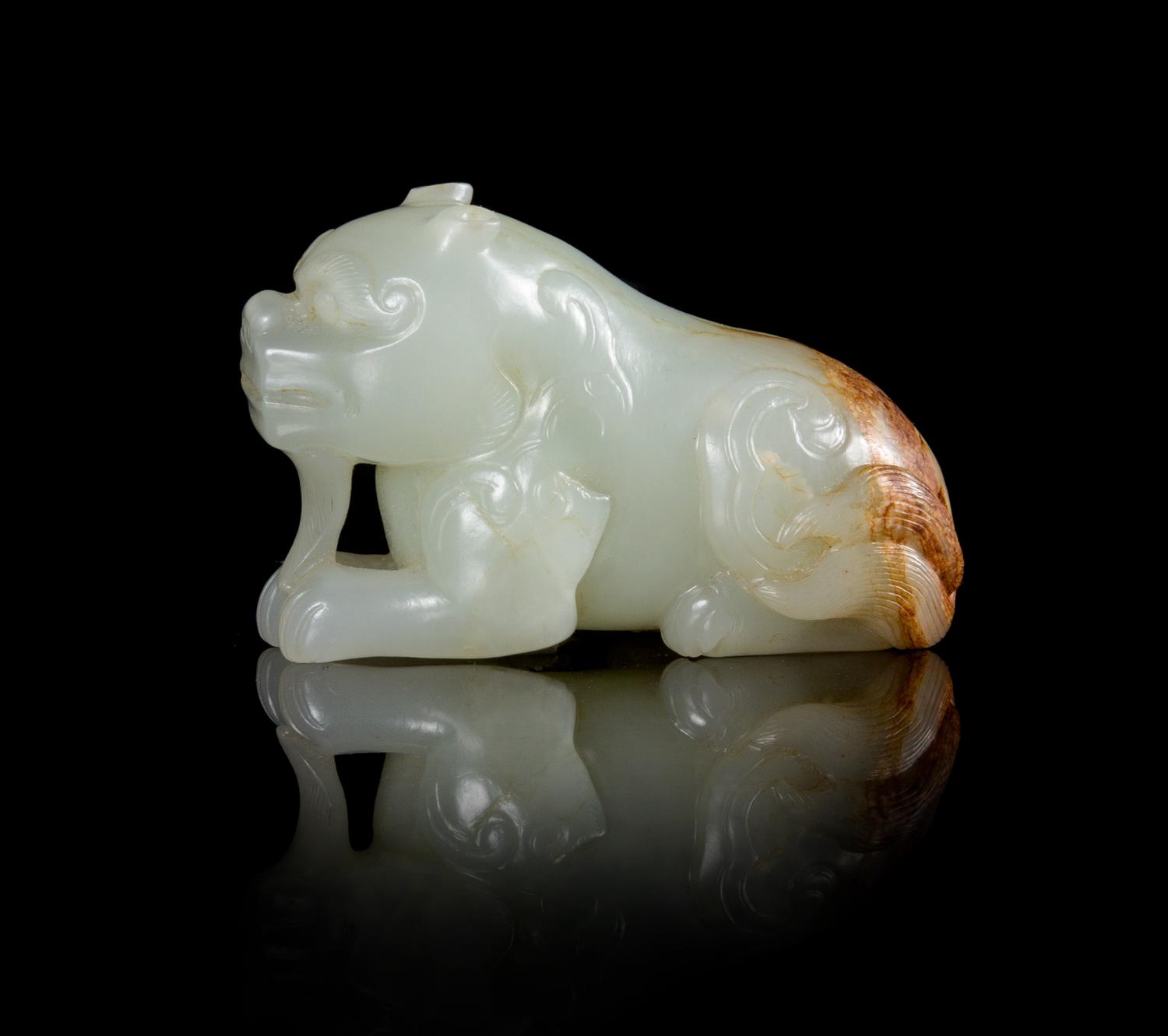 A Celadon Jade Toggle of a Beast Length 2 1/2 inches.