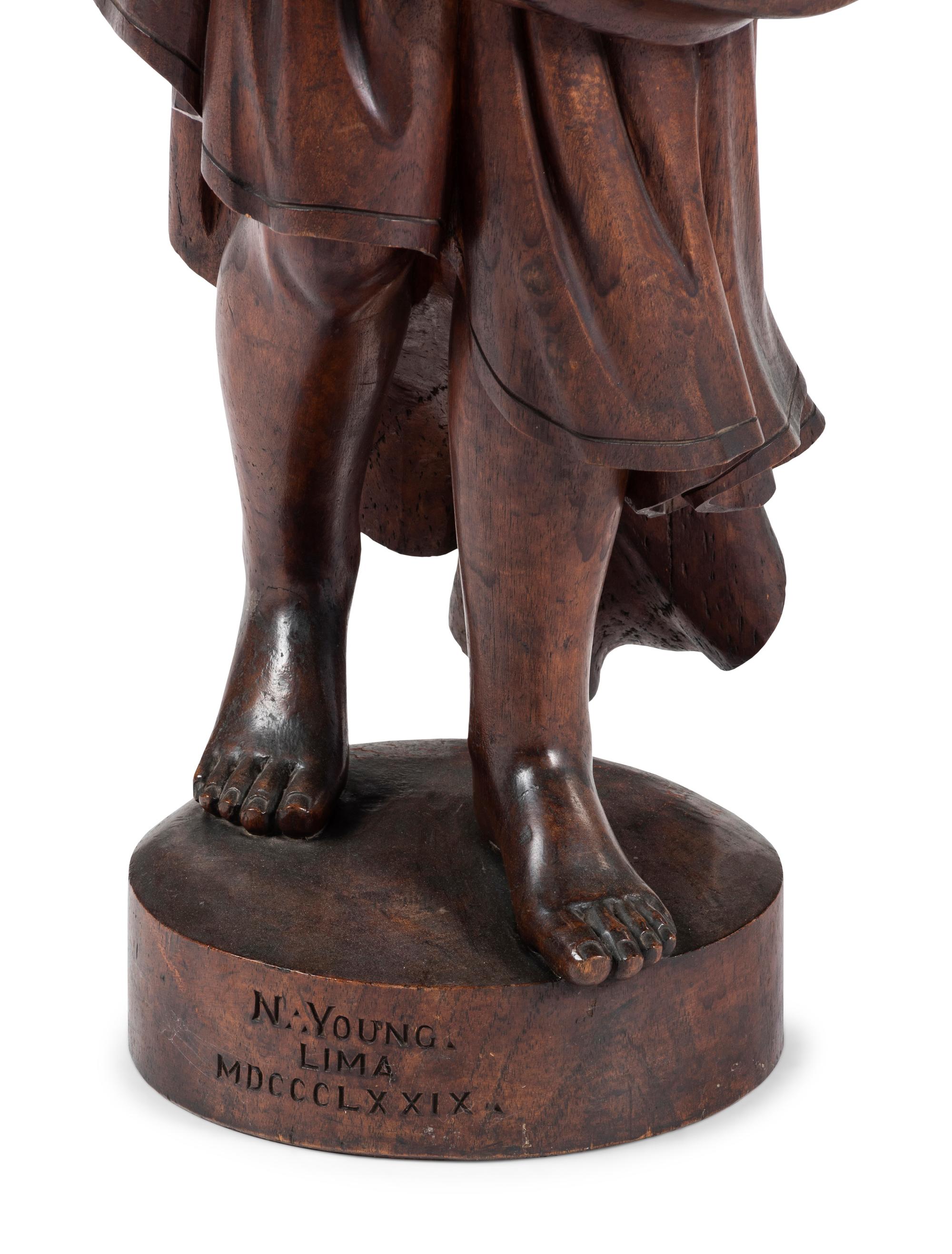 A Carved Walnut Figure of Angel Gabriel