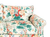 A Printed Cotton-Upholstered Three-Cushion Sofa, Club Chair and Ottoman