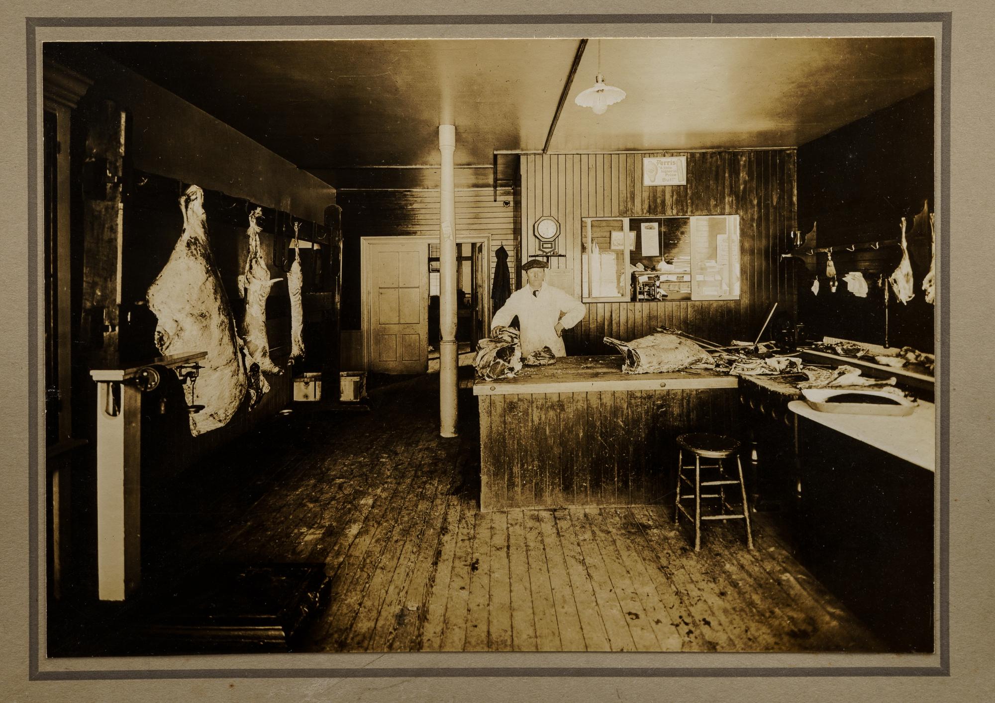 Nine Photographs Depicting Storefronts and Various Interiors