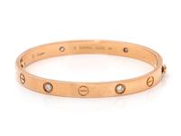 CARTIER, ROSE GOLD AND DIAMOND 'LOVE' BRACELET