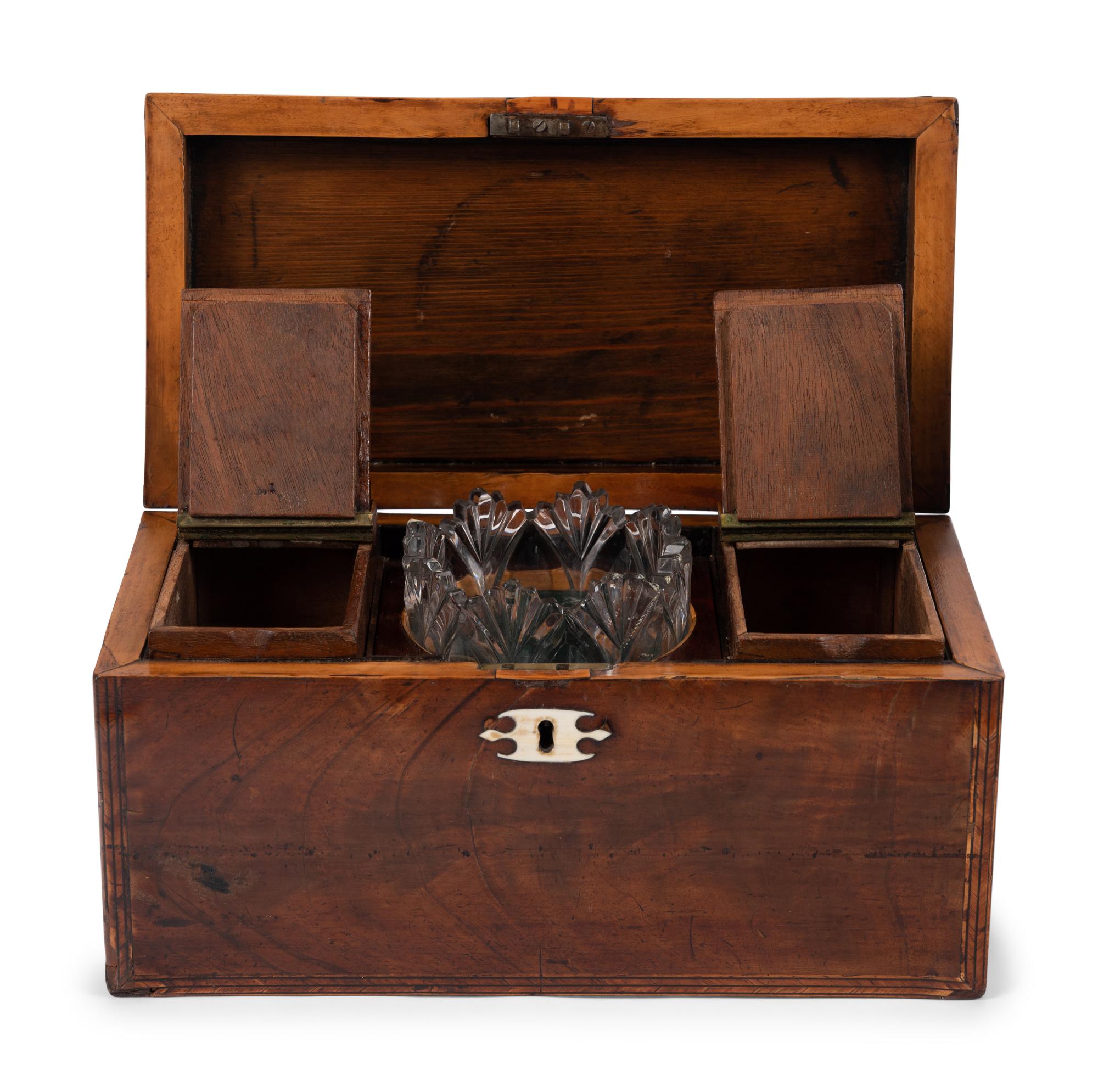 An English Mahogany Tea Caddy and an English Japanned Dressing Box