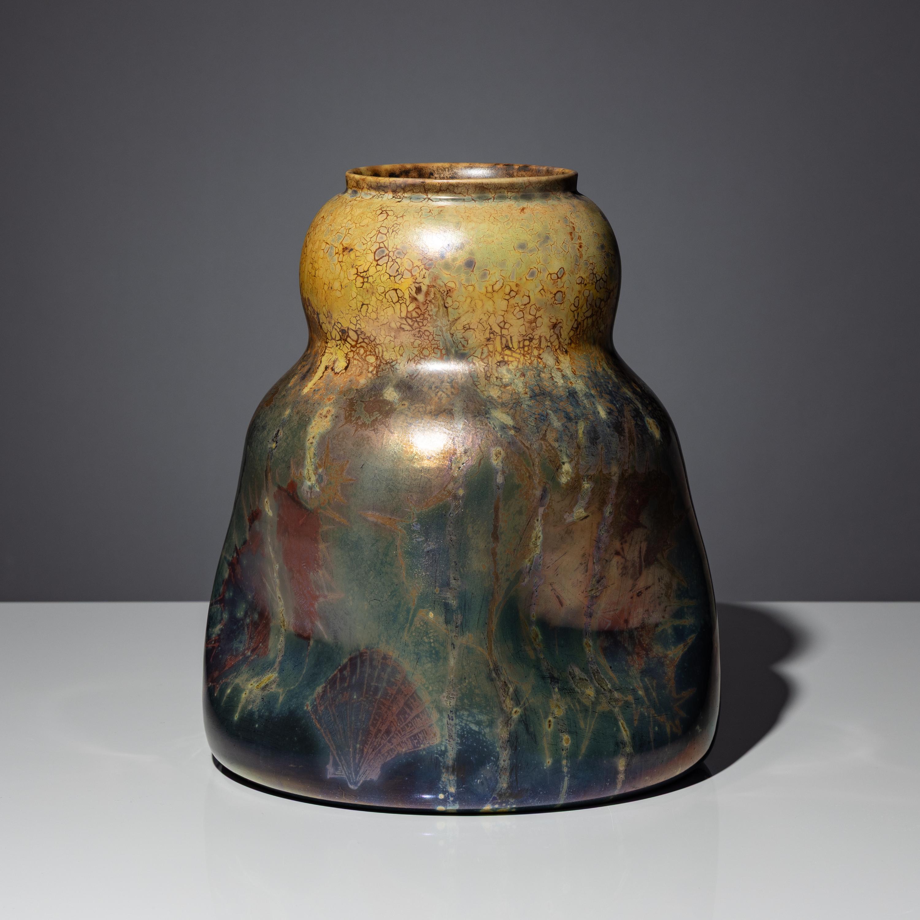 Large vase with seashell decor