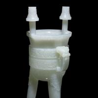 A Chinese Carved Pale Celadon Jade Tripod Vessel, Jia, Late Qing - Early Republic Period 晚清/民國 青白玉仿古斝