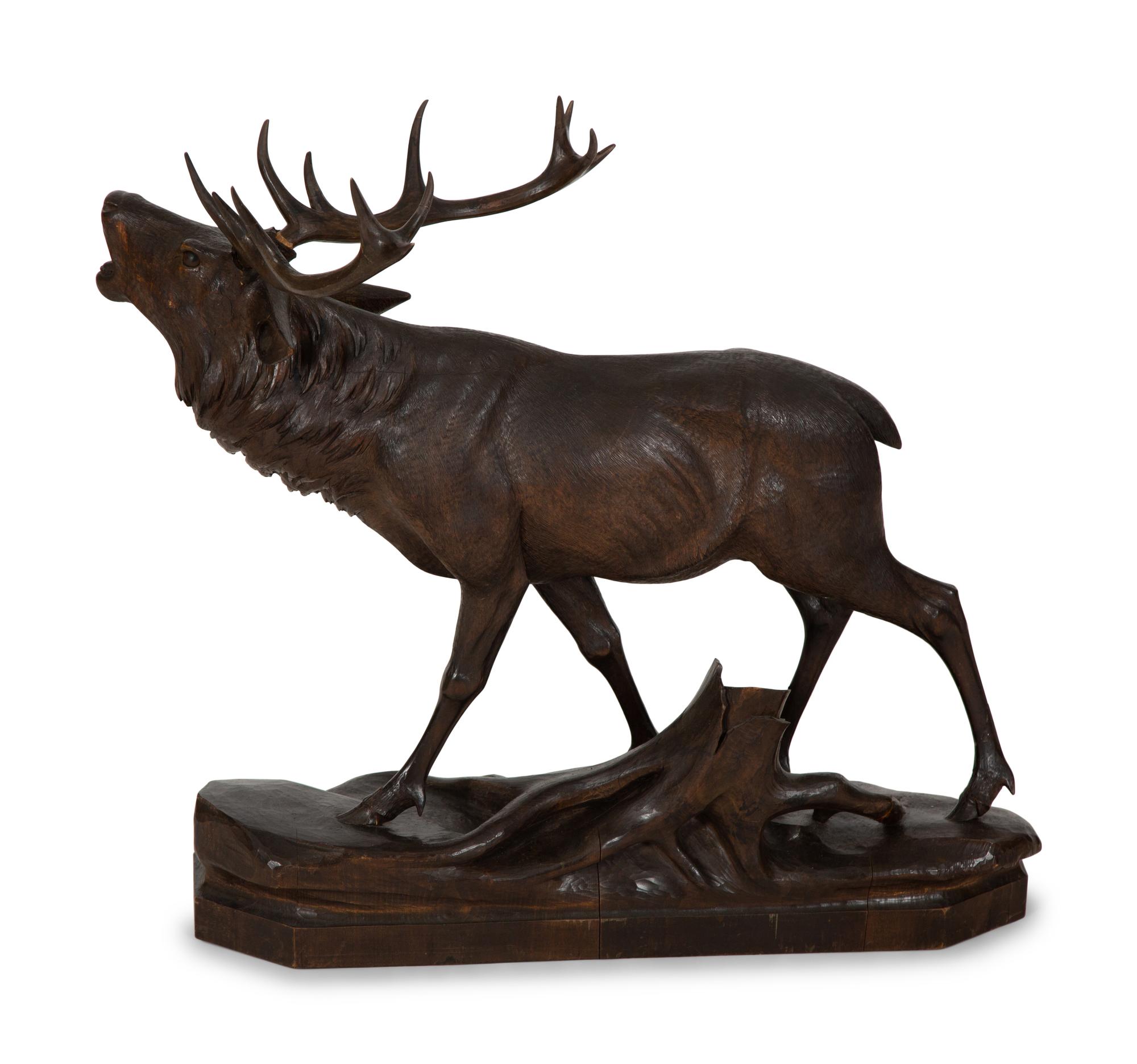 A Swiss Black Forest Carved Walnut Figure of an Elk
