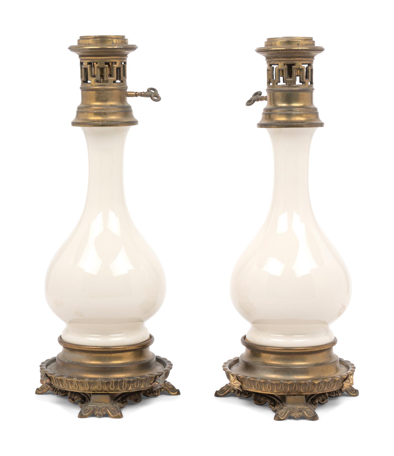 A Pair of French Opaline Glass Fluid Lamps with Etched Glass Shades Converted to Electricity