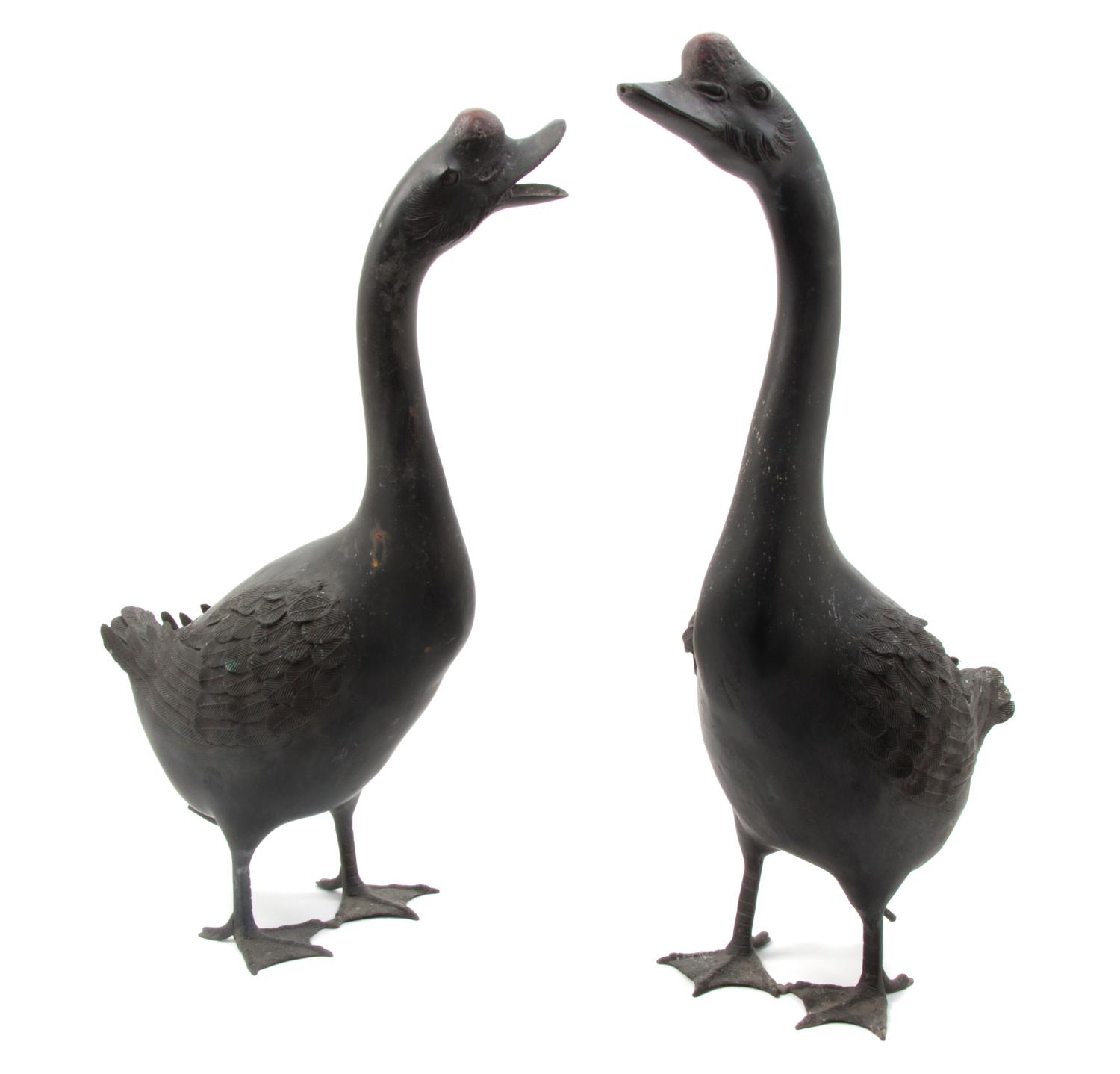 A Pair of Japanese Painted Lead Geese, Height of taller 24 3/8 inches.