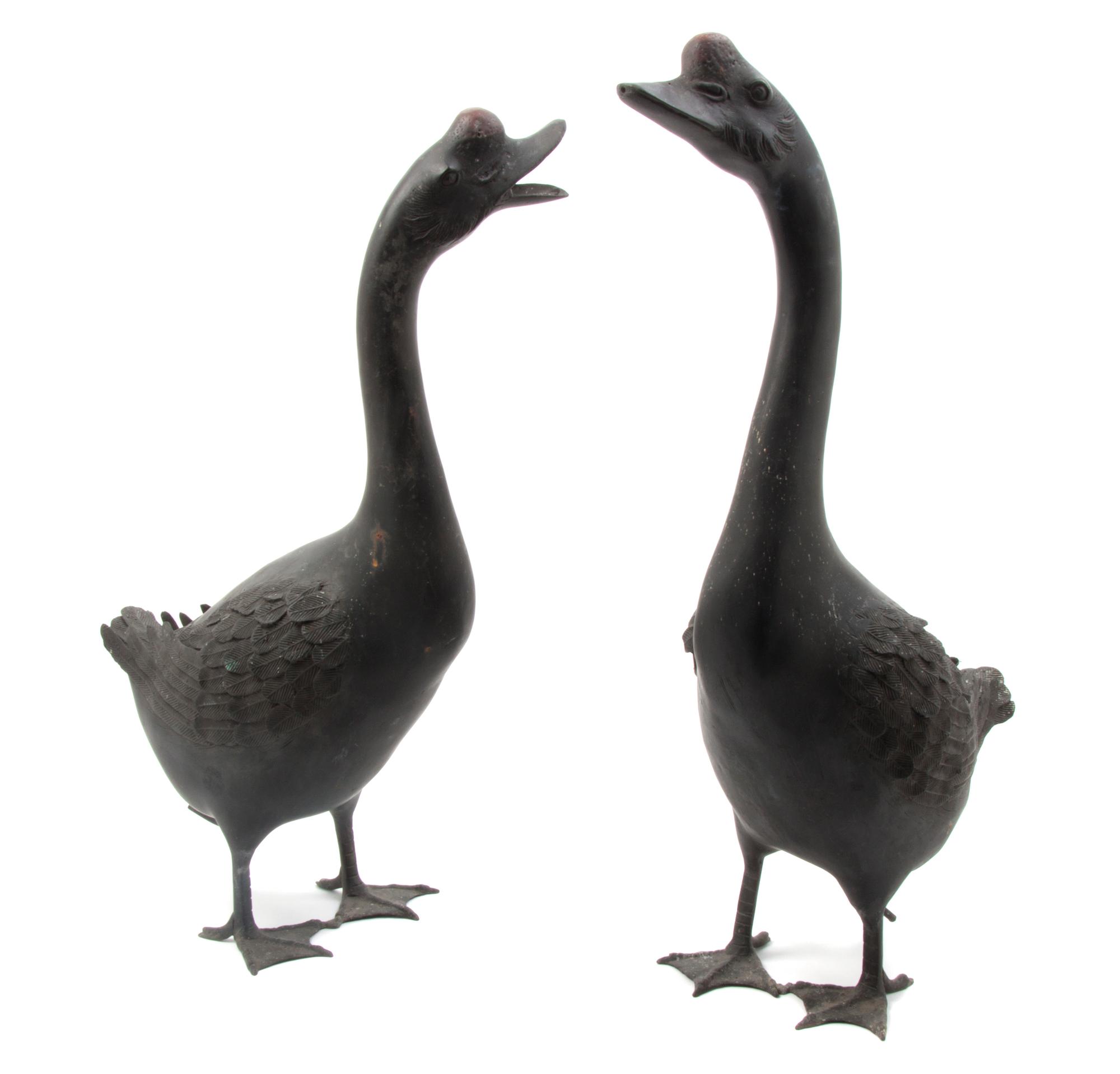 A Pair of Japanese Painted Lead Geese, Height of taller 24 3/8 inches.