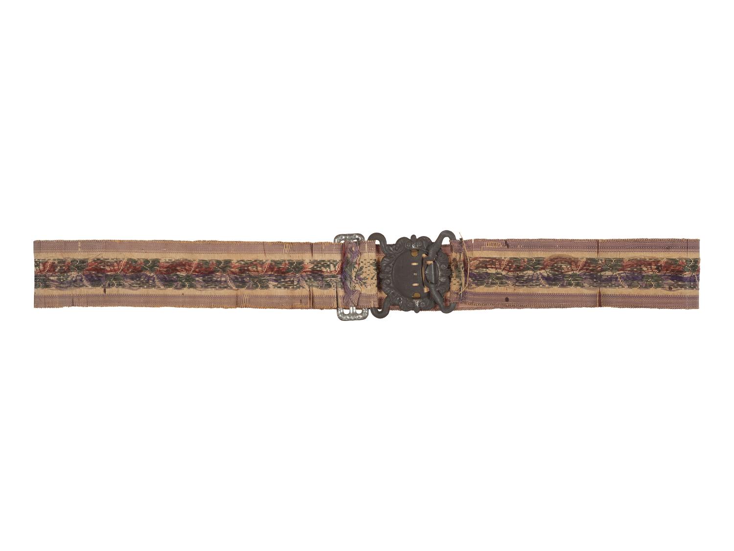 [CIVIL WAR]. Woman's woven belt with buckle containing gem-size tintype of a Civil War soldier.
