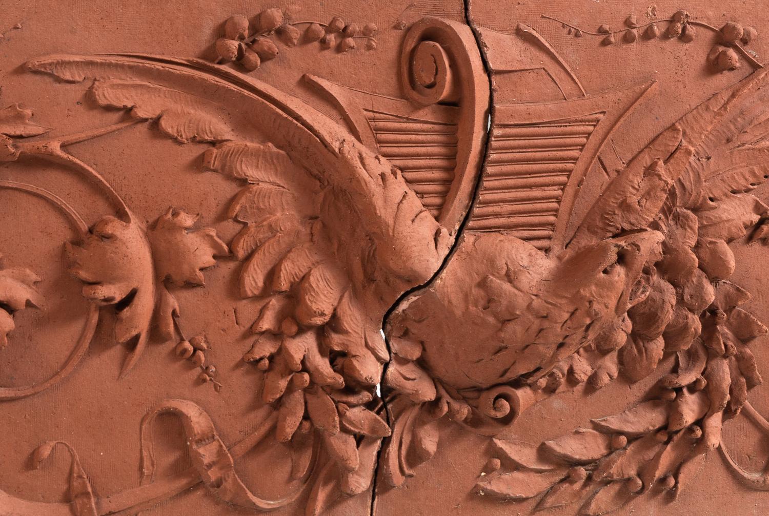 A Terra Cotta Two-Part Architectural Frieze Panel