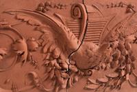 A Terra Cotta Two-Part Architectural Frieze Panel