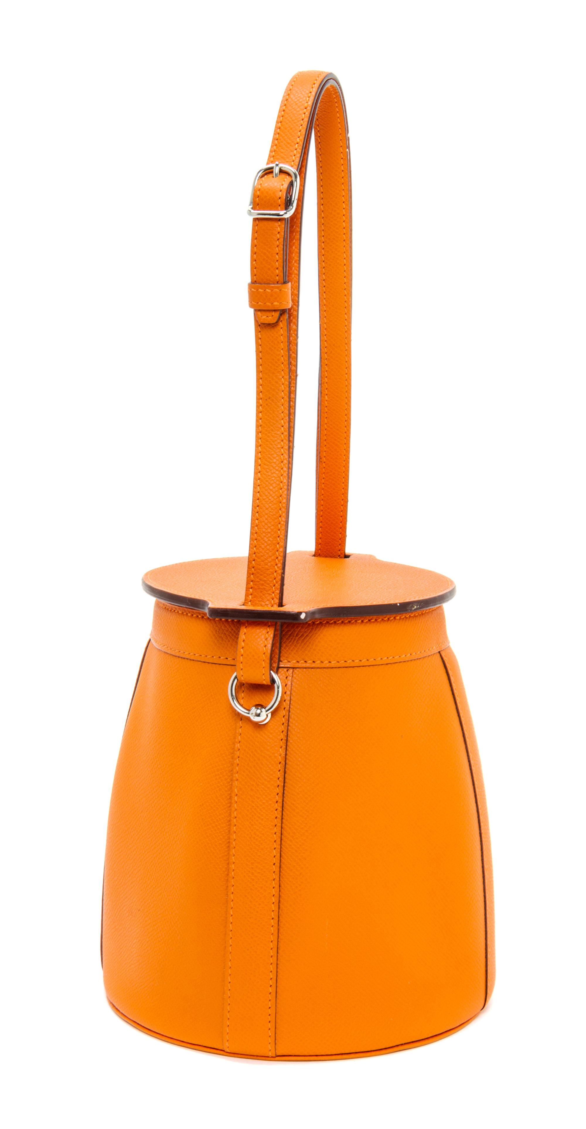 An Hermes Orange Clemence Feed Handbag, 6.75" x 7.25" x 5".