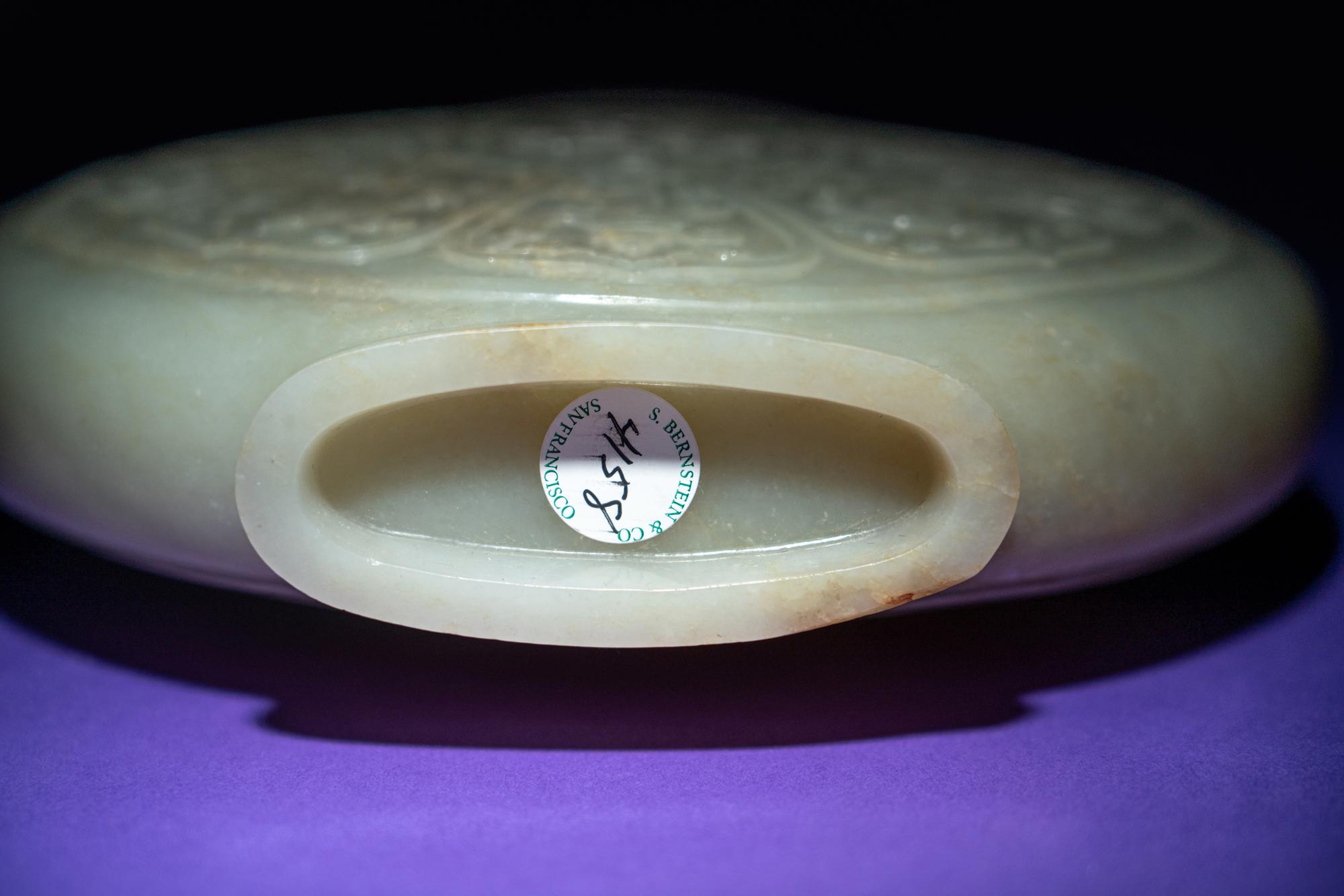 A Rare and Finely Carved Chinese White Jade Covered Vase