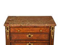 A Louis XVI Diminutive Marble-Top Four Drawer Chiffonier