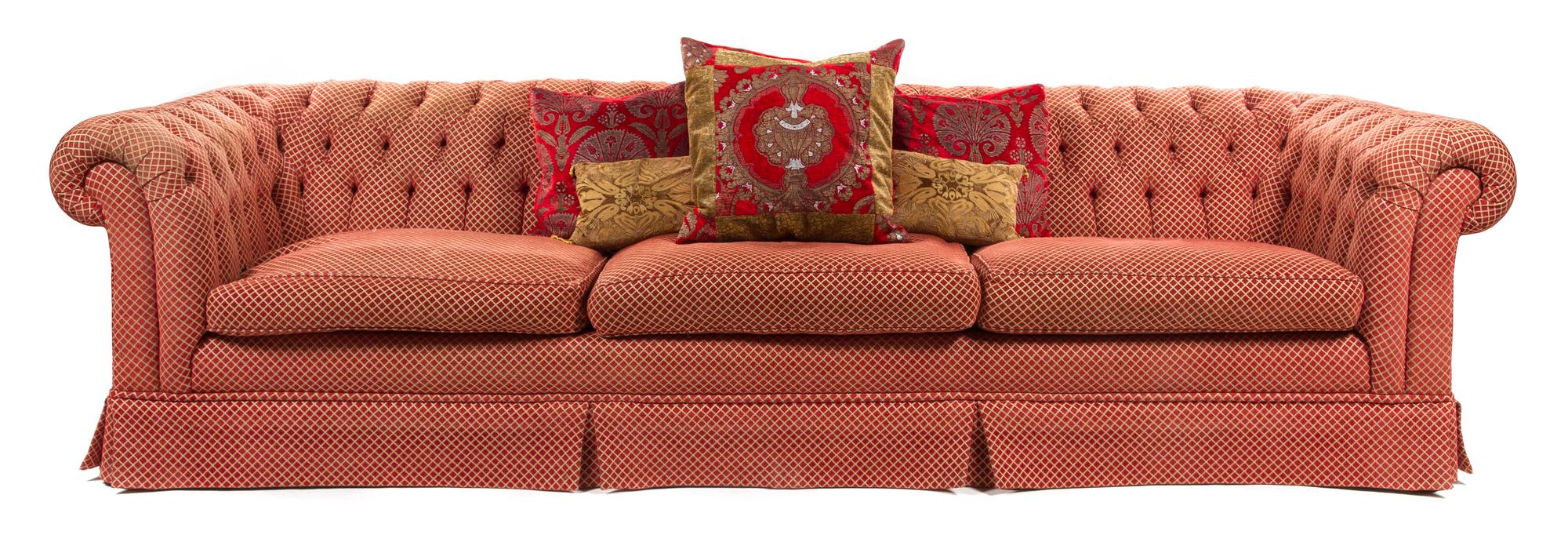 A Button Tufted Three-Seat Sofa Height 29 x width 114 x depth 37 1/2 inches.