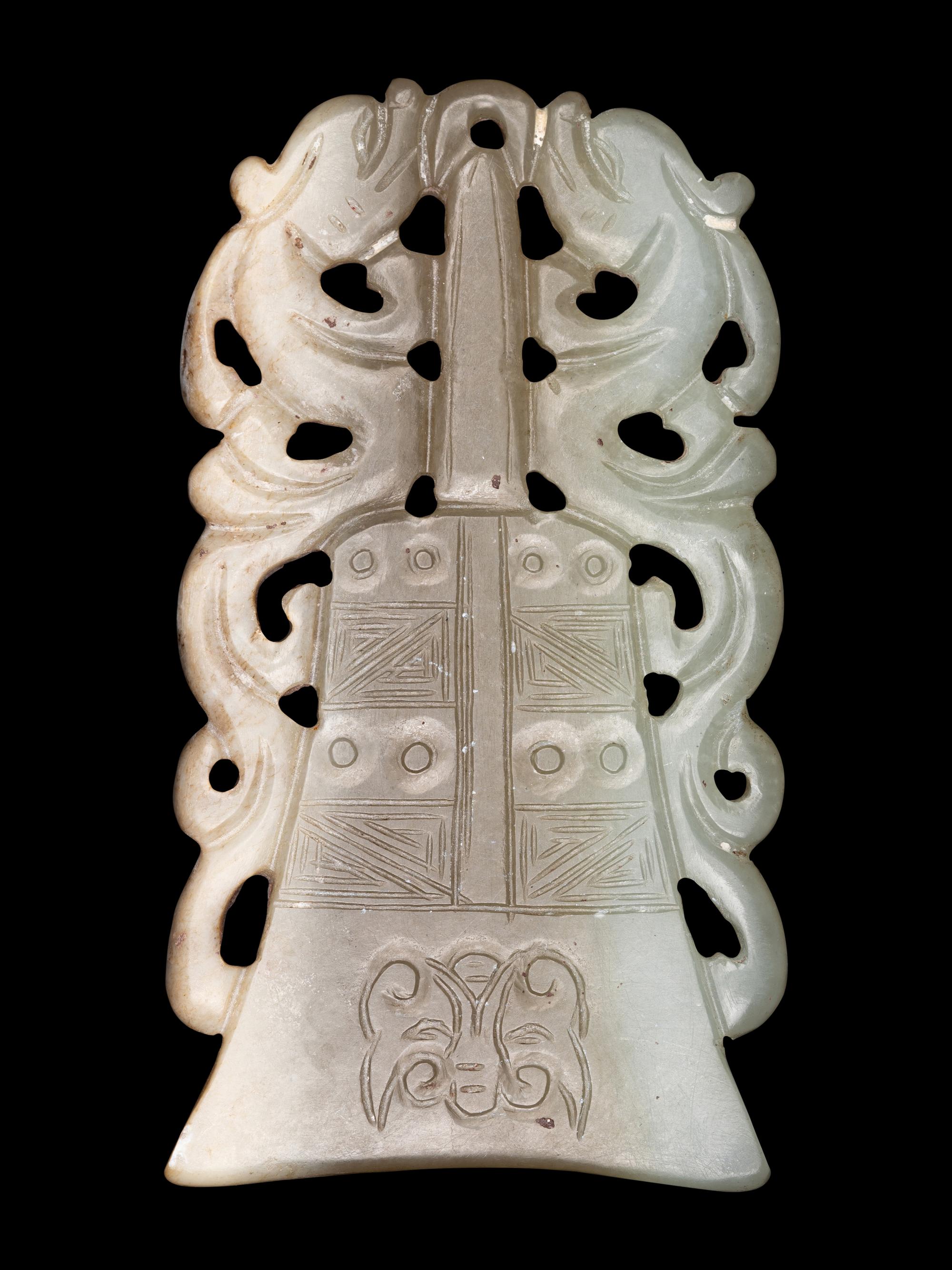 Two Celadon Jade Bell-Form Pendants