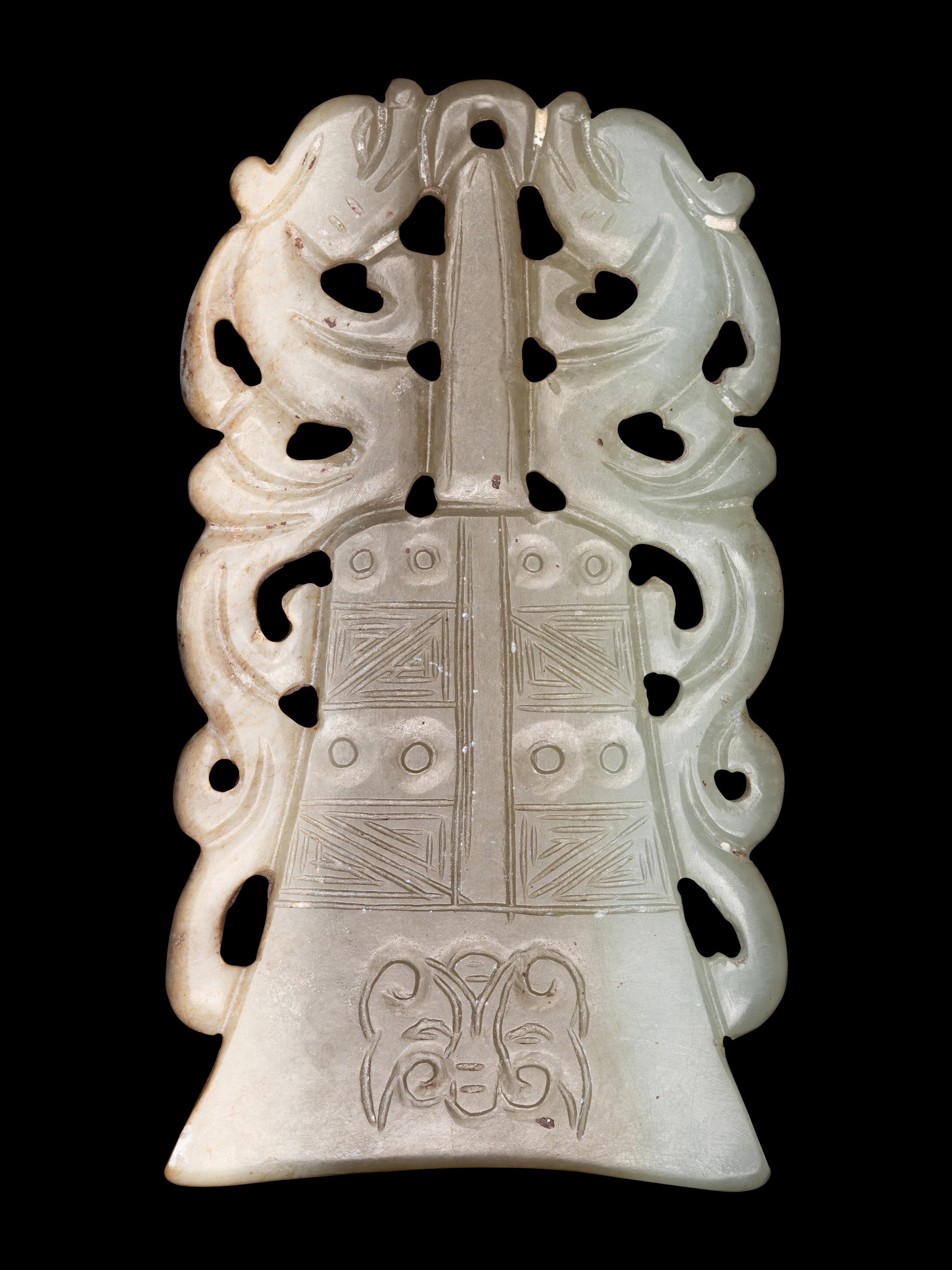 Two Celadon Jade Bell-Form Pendants