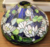 A Japanese Bronze Lamp with an Associated American Leaded Glass Shade Height overall 47 1/2 inches.