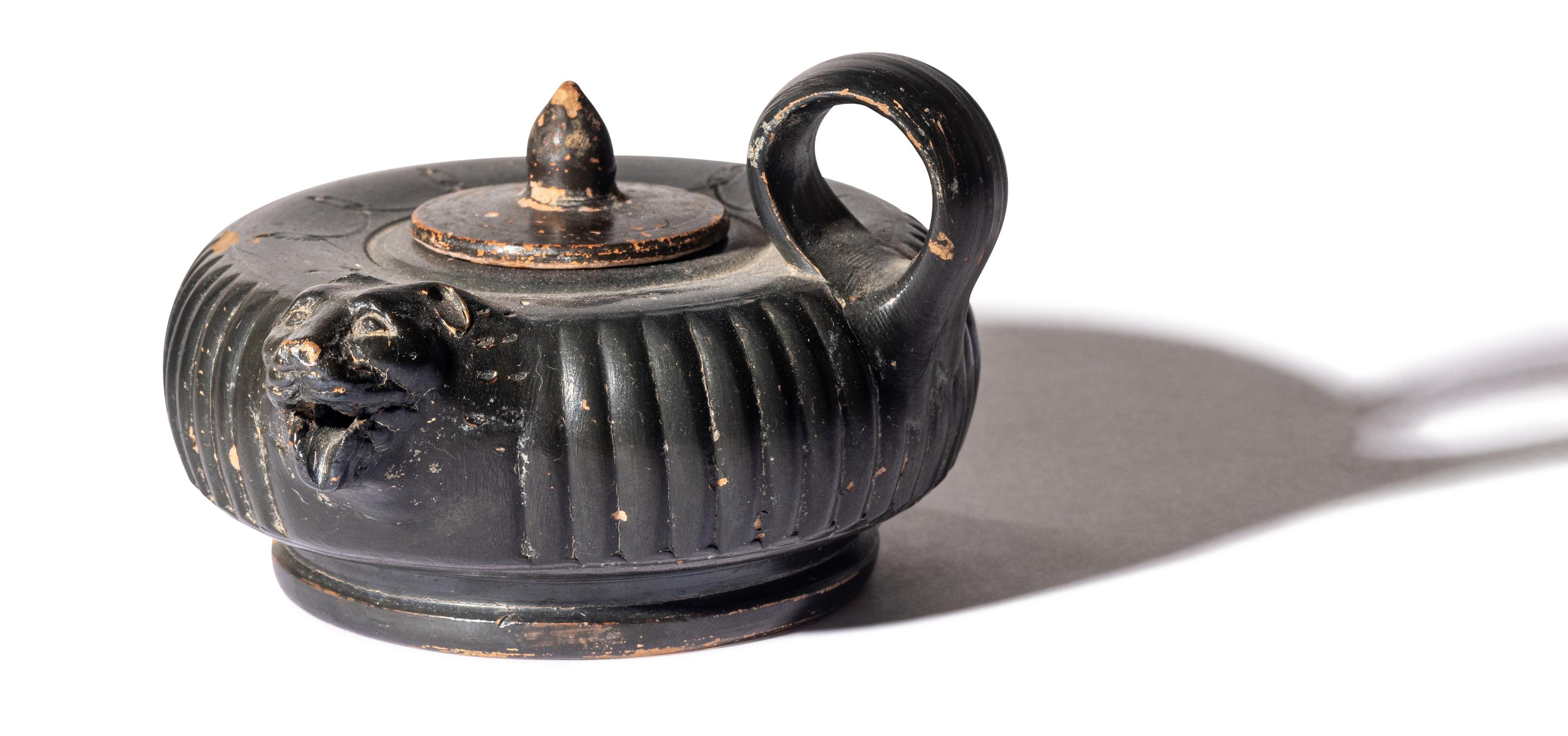 A Greek Black-Glazed Guttus