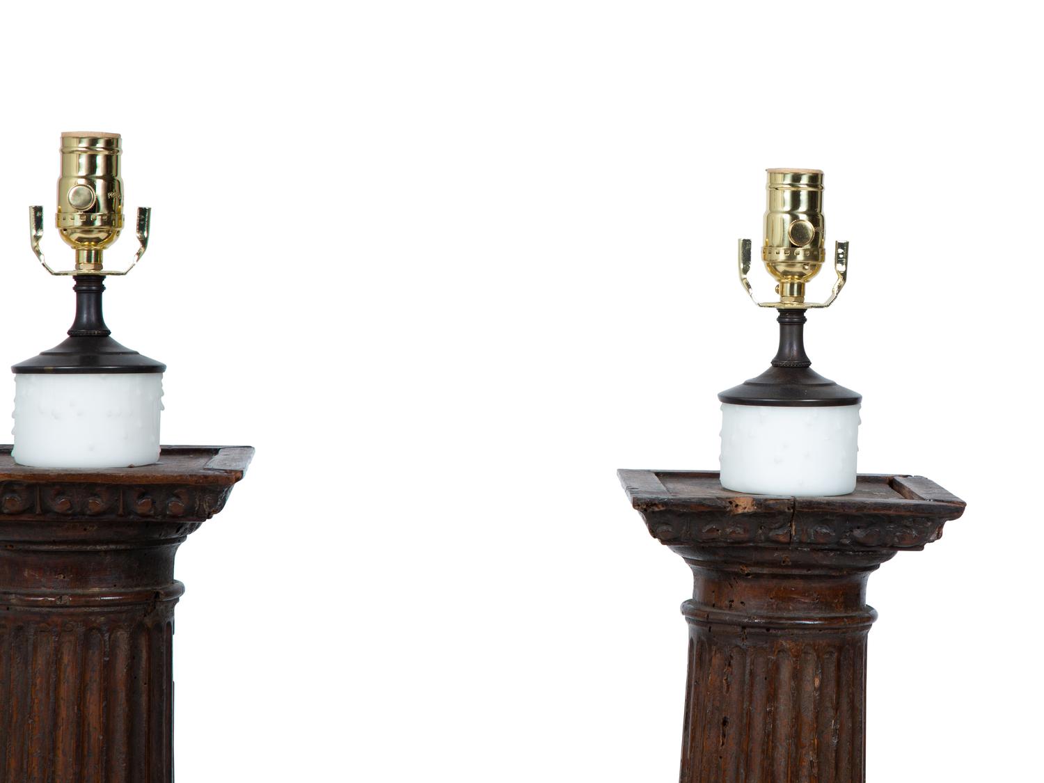 A Pair of Italian Carved Walnut Columns Mounted as Lamps — 18TH CENTURY
