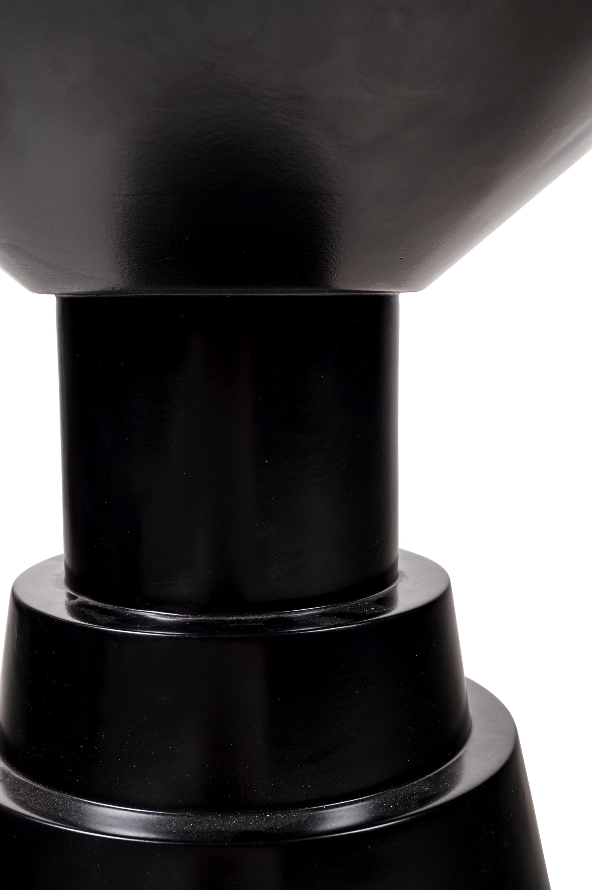 A Pair of Black Painted Pedestals
