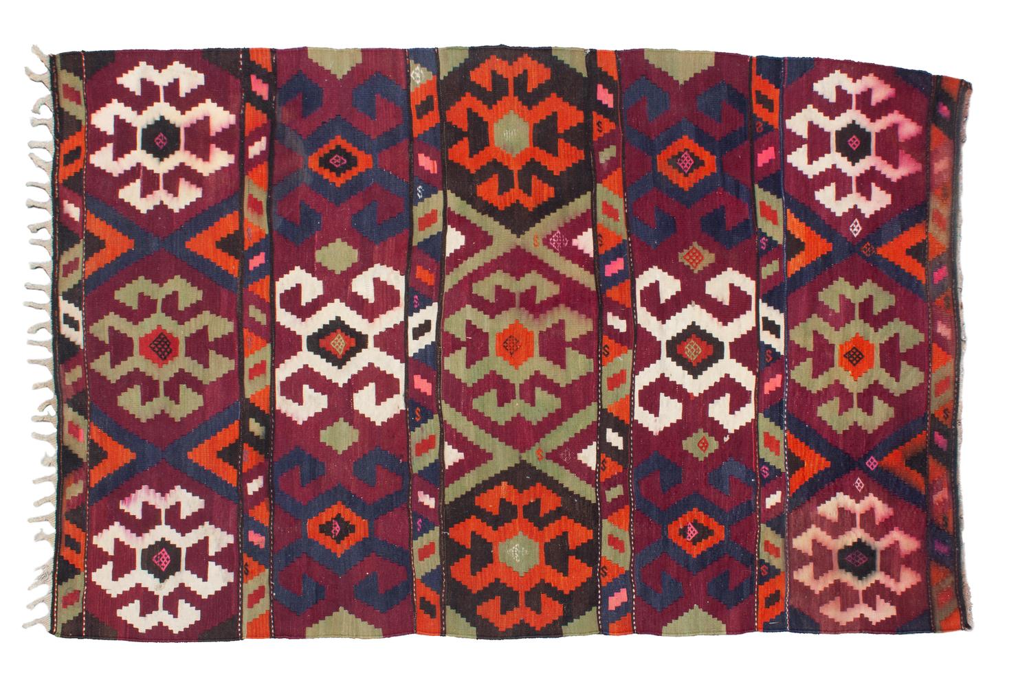 A Kilim Rug 8' 6" x 5' 9" — 20TH CENTURY