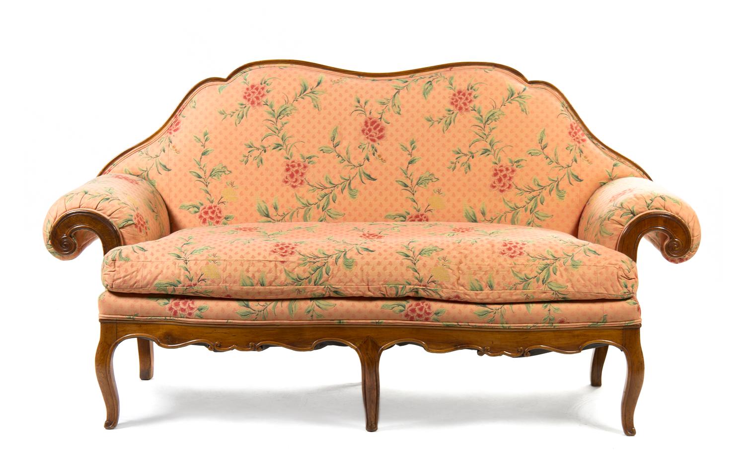 An Italian Carved Walnut Settee, Width 73 inches.