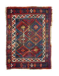 Two Caucasian Wool Rugs — 20TH CENTURY
