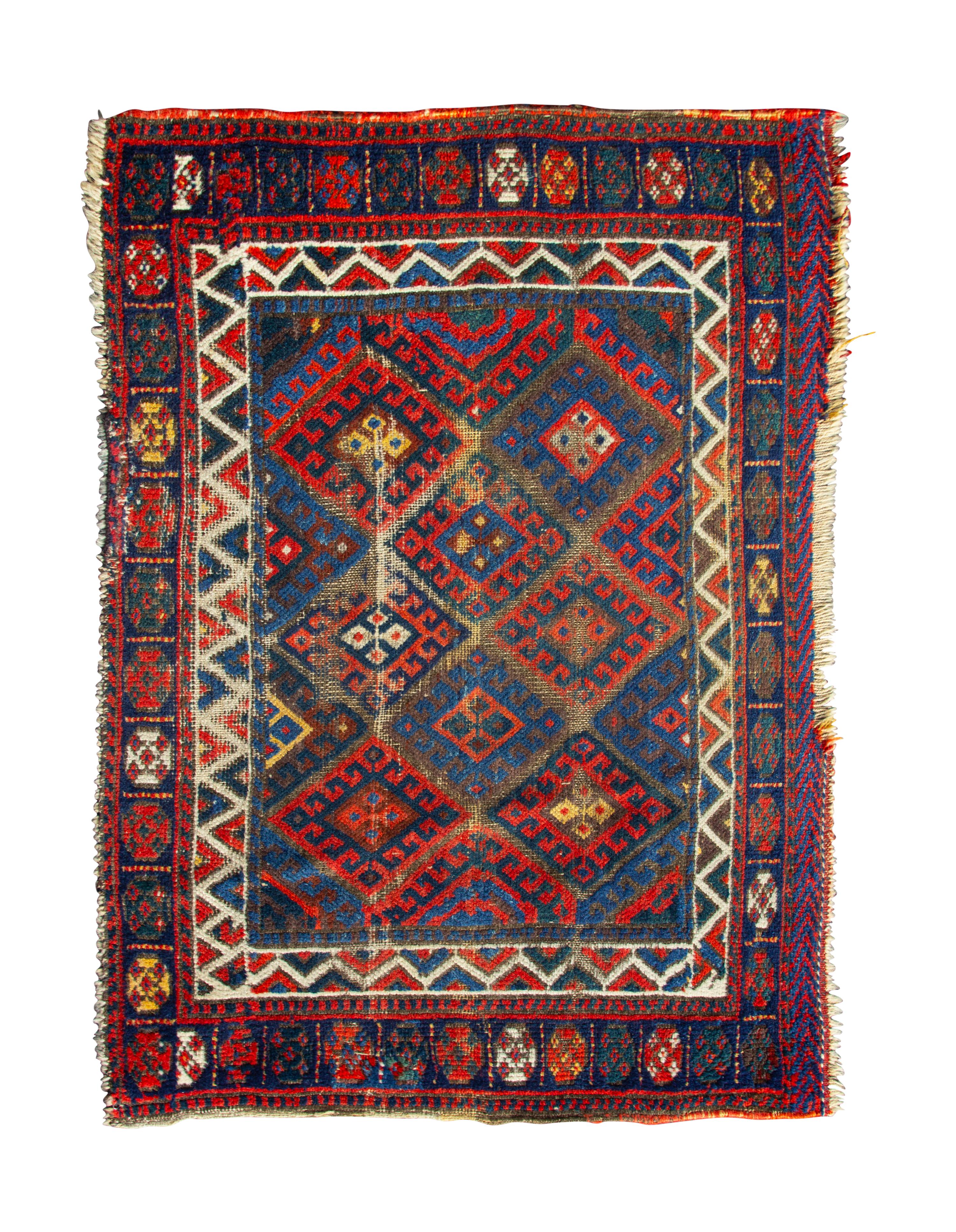 Two Caucasian Wool Rugs — 20TH CENTURY
