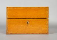 An English Satinwood and Walnut Tea Caddy, Height 6 1/8 x width 9 1/4 x depth 5 3/8 inches.