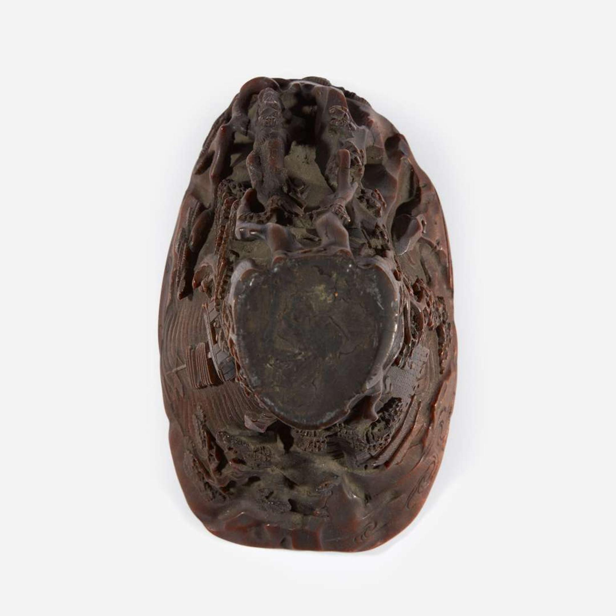 A Chinese Carved Rhinoceros Horn Libation Cup 17th/18th century