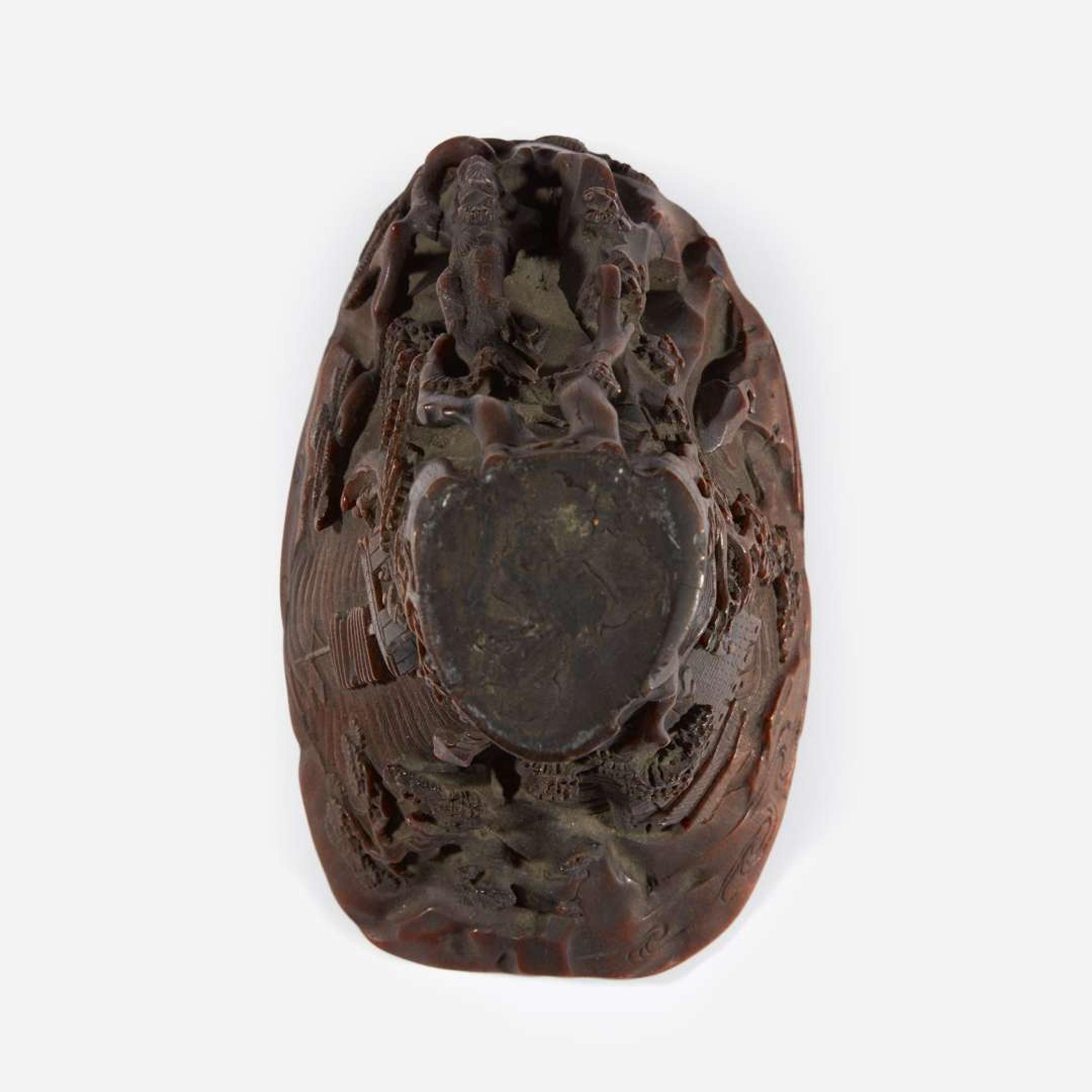 A Chinese Carved Rhinoceros Horn Libation Cup 17th/18th century