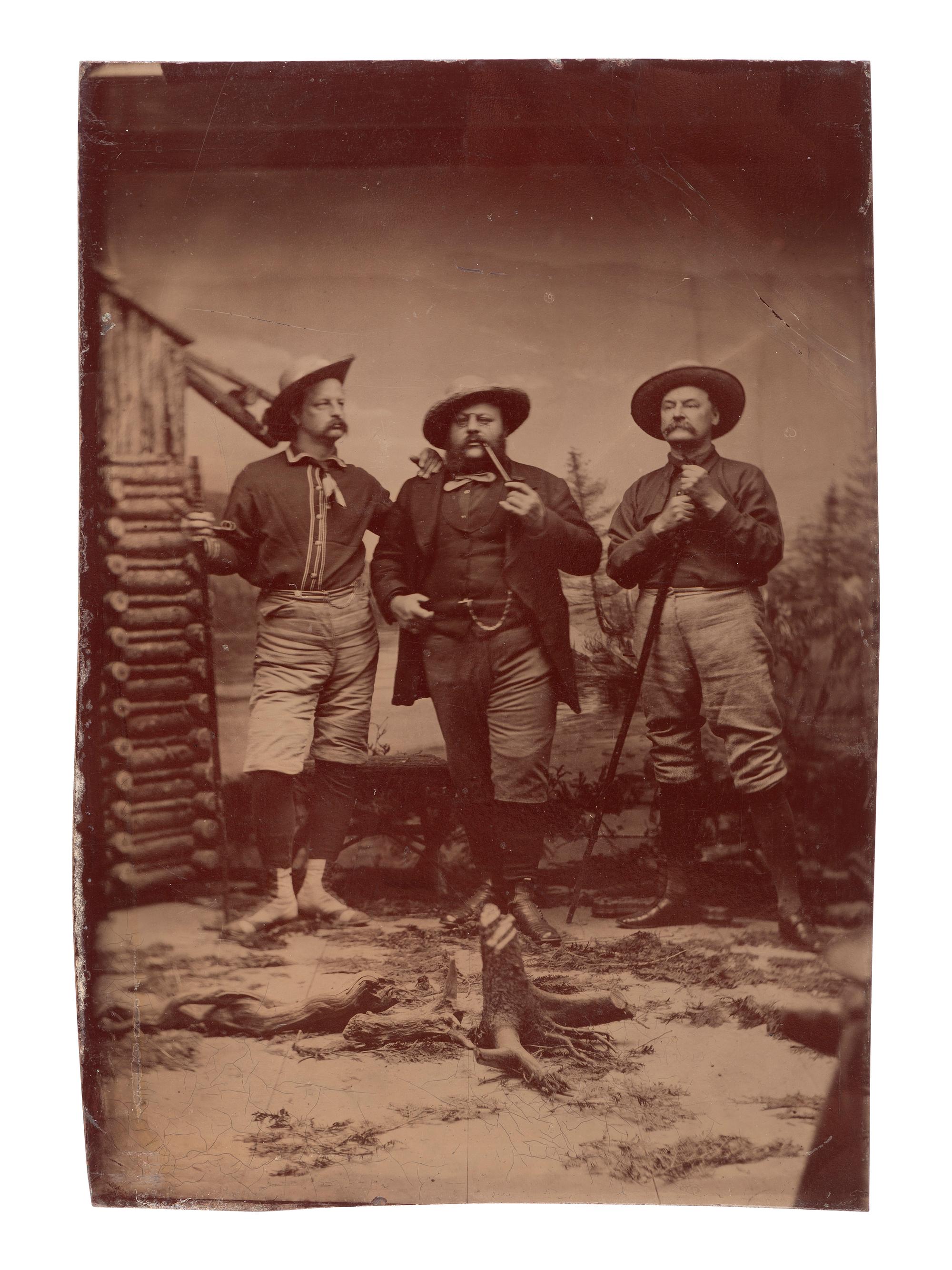 [EARLY PHOTOGRAPHY]. Occupational tintype of a trio of possible surveyors or miners.
