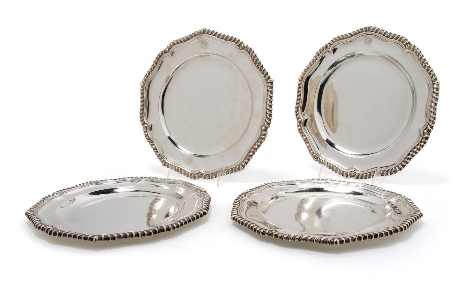 A Set of Four English Silver Plates, London, Diameter 9 3/4 inches.
