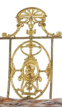 A Neoclassical Iron and Bronze Chair in the Style of Oscar Bach