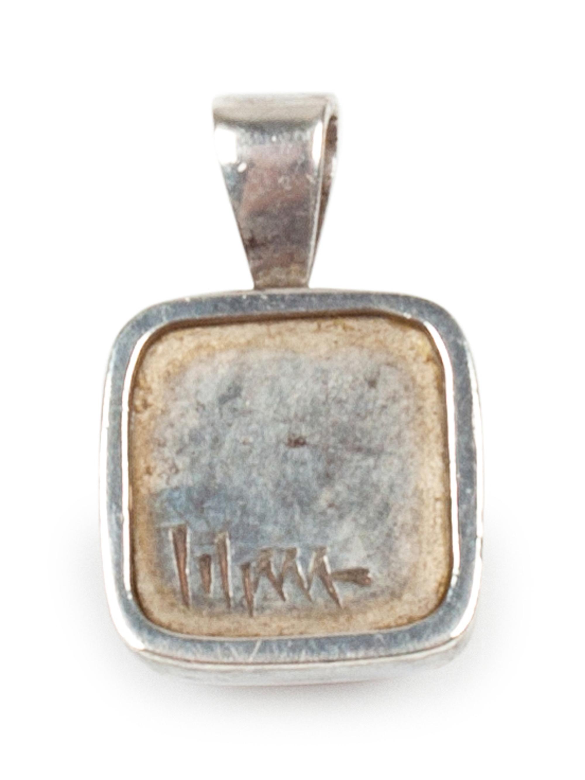 Sterling silver and charoite pendant with gold accents