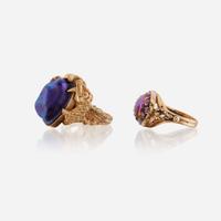 A collection of fourteen karat gold and glass jewelry