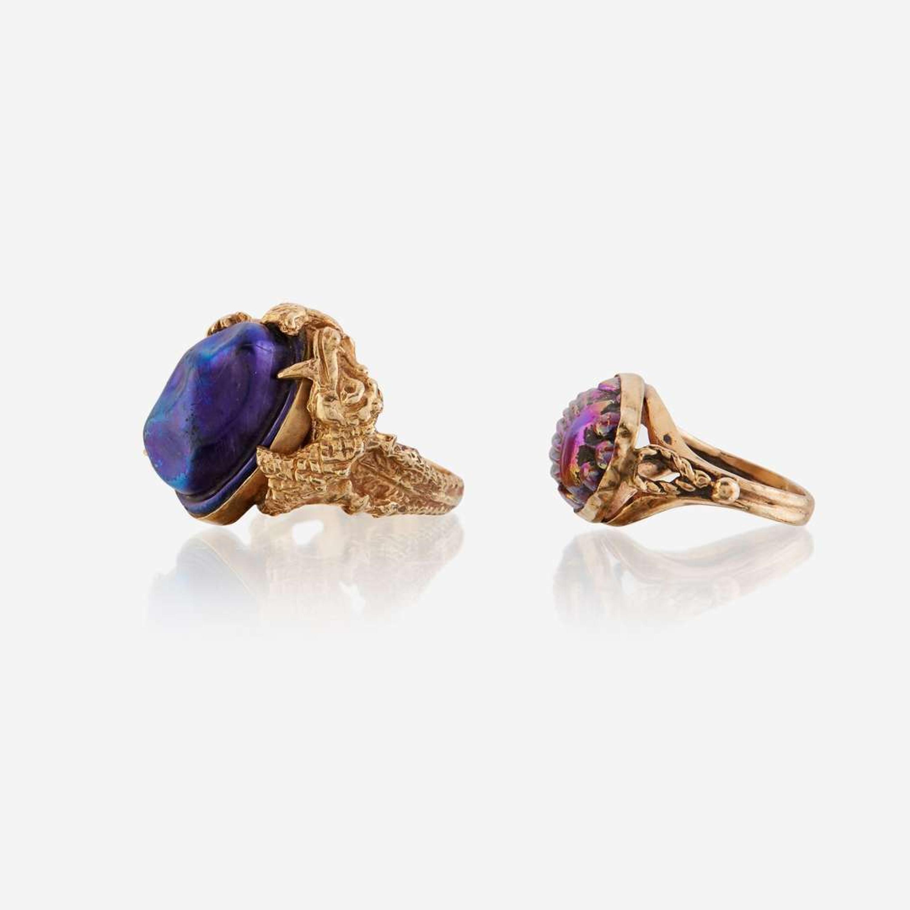 A collection of fourteen karat gold and glass jewelry