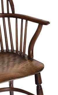 An Assembled Set of Nine Yew, Elm and Beechwood Windsor Armchairs
