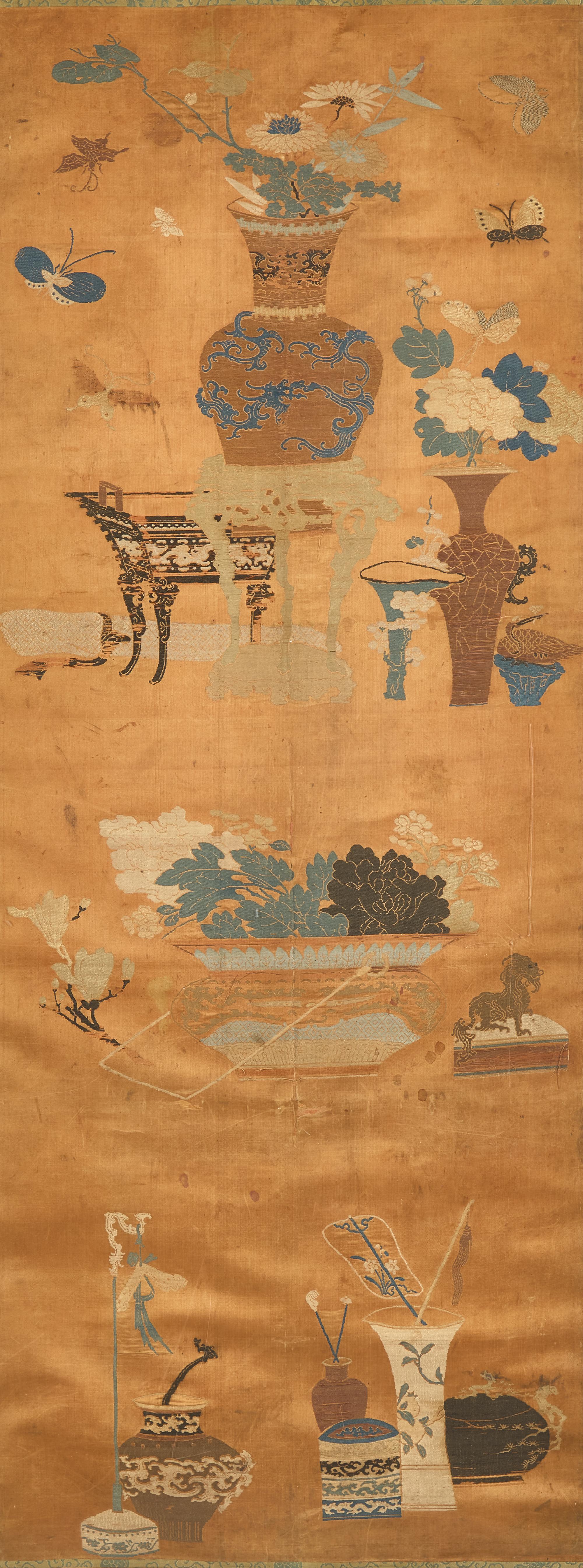 A Chinese Apricot Ground Kesi Silk 'Bogu' Panel, Qing Dynasty — 清 杏子地緙絲博古圖挂屏