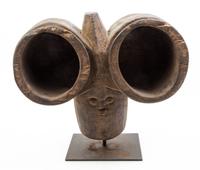 Four African Carved Wood Articles Height of tallest 26 1/2 inches.