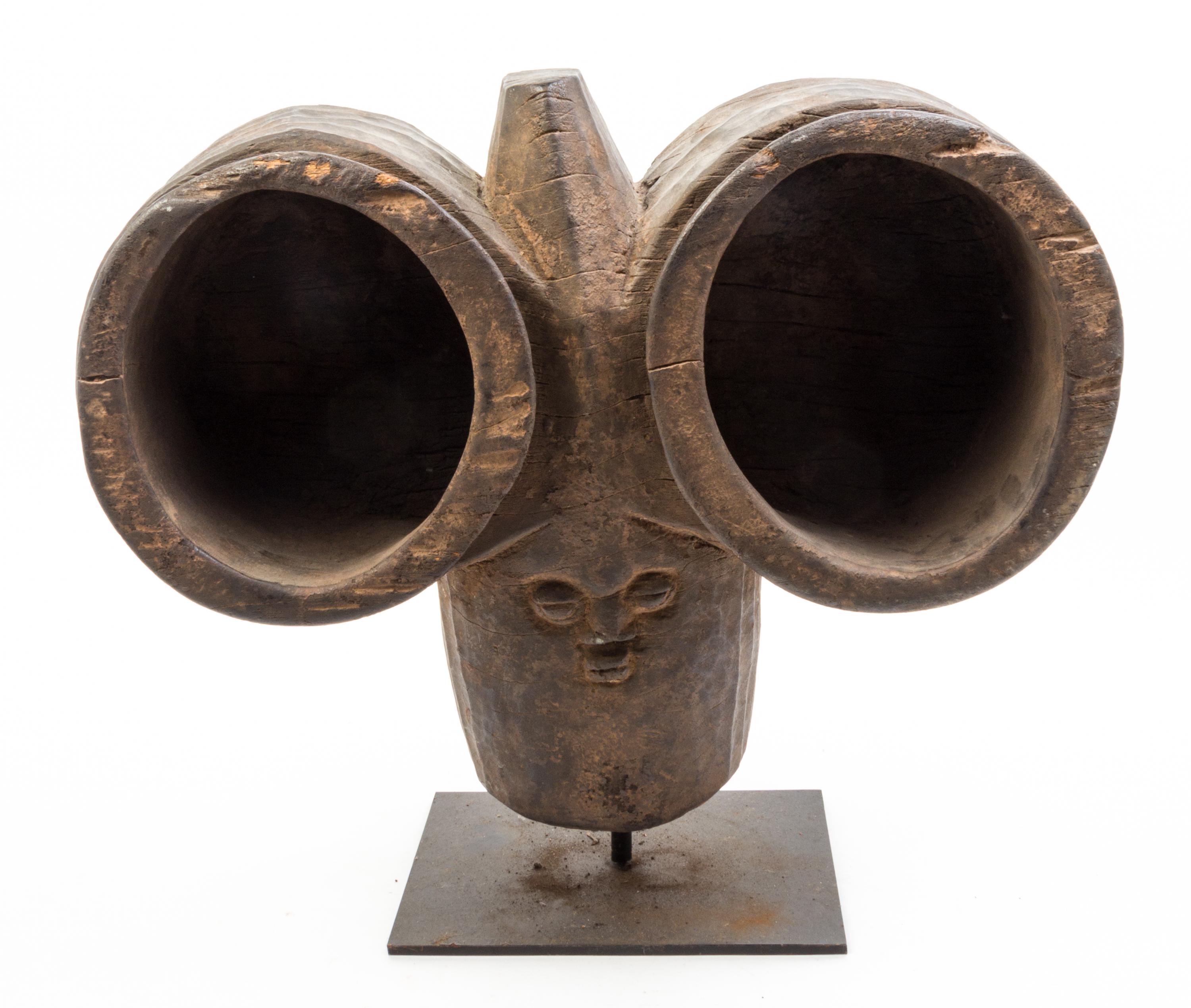 Four African Carved Wood Articles Height of tallest 26 1/2 inches.