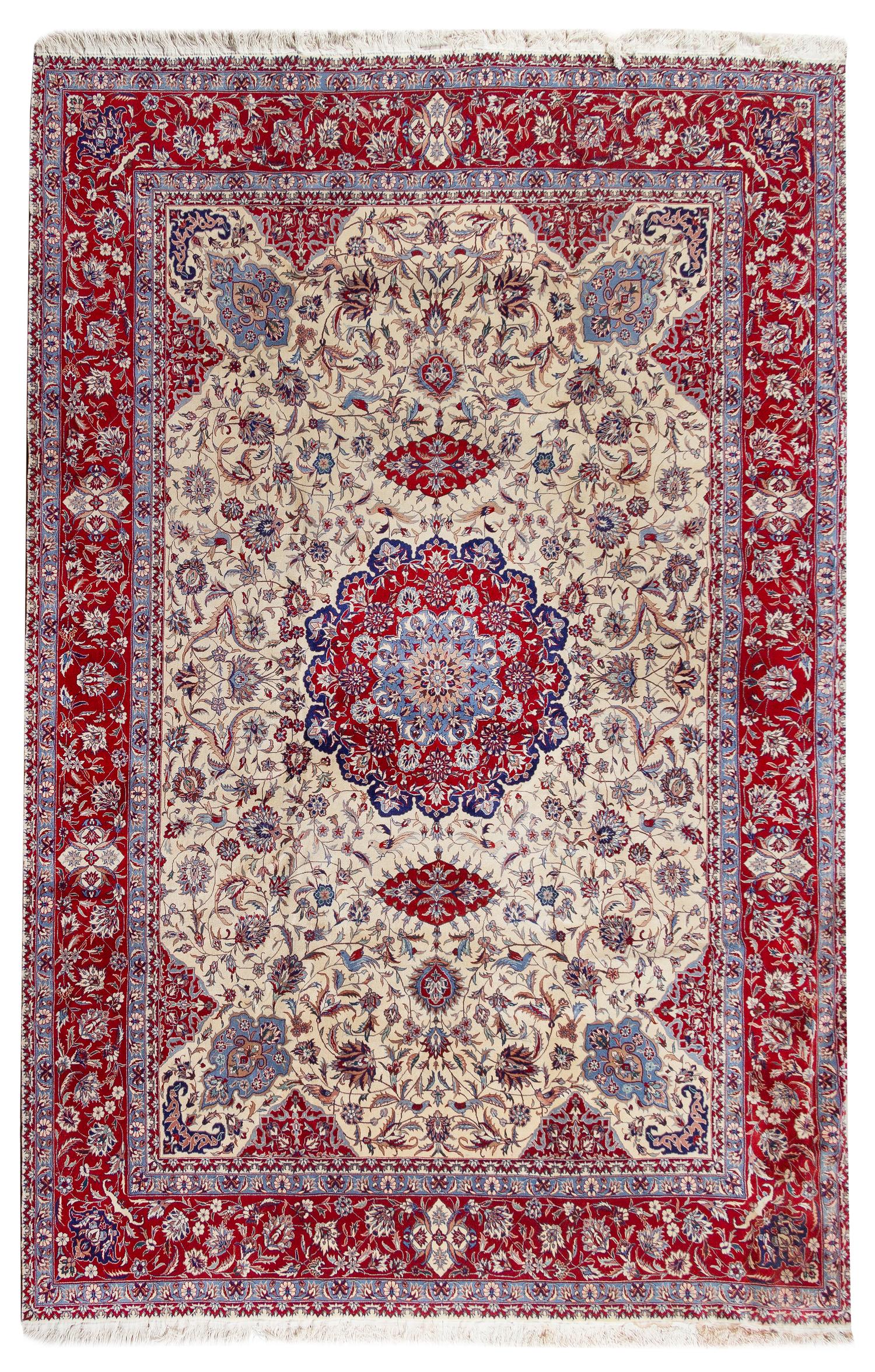 An Isfahan Wool Rug 11 feet 9 inches x 8 feet 4 1/2 inches. — 20TH CENTURY